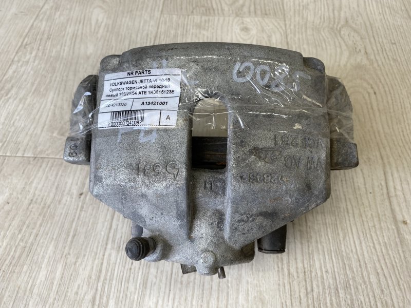 Суппорт тормозной передний левый VOLKSWAGEN JETTA USA 10-17 2016 162 1.4 CZTA 1K0 615 123 B Б/У