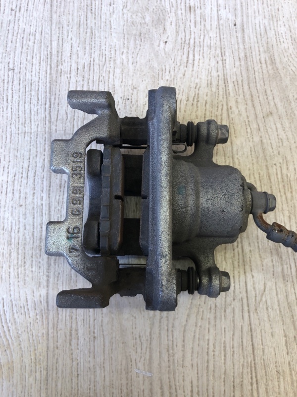 Суппорт тормозной задний левый NISSAN PATHFINDER R52 12-21 R52 3.5 VQ35DD