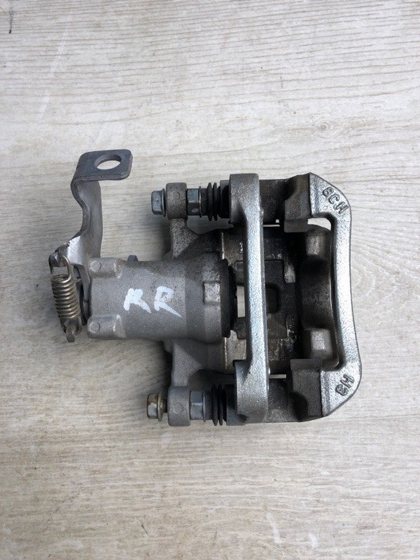 Суппорт тормозной задний правый KIA FORTE YD 12- BD 2.0 G4NH