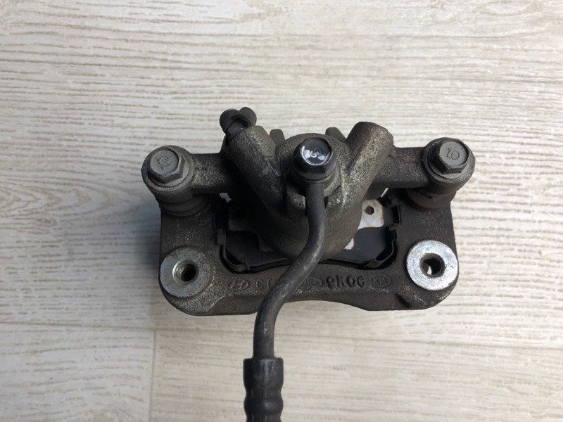 Суппорт тормозной задний правый FORTE/CERATO TD 08-13 2009 TD 2.0 G4KD