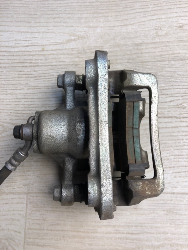 Суппорт тормозной задний левый HYUNDAI SONATA LF 2014- LF 2.4 G4KJ