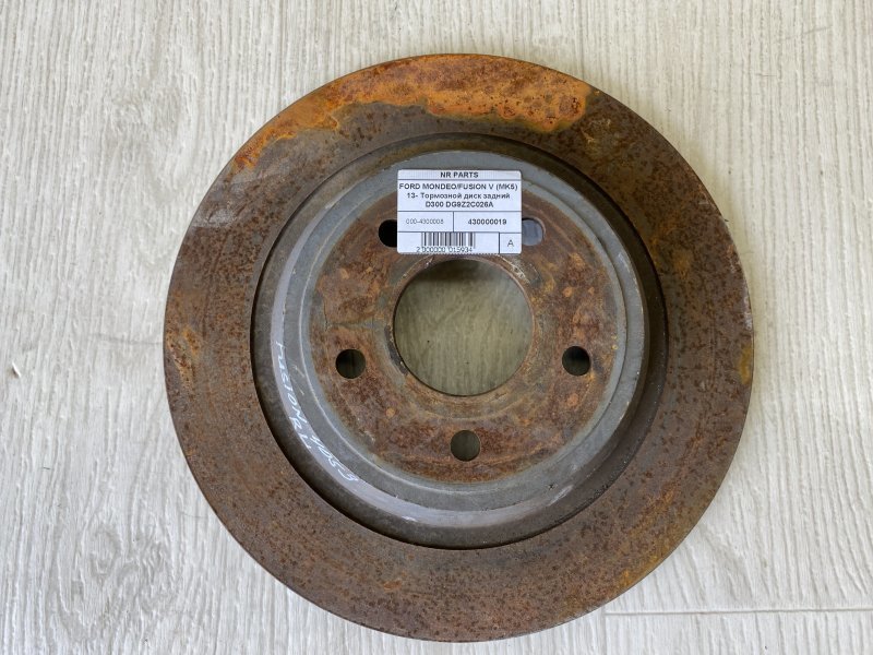 Запчасть тормозной диск задний FORD FUSION 14- 2015 CD4 1.5 HDTX KS7Z-2C026-B Б/У Тормозной диск задний FORD FUSION 14- 2015 CD4 1.5 HDTX KS7Z-2C026-B Б/У