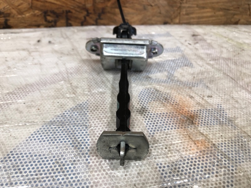 Ограничитель двери передний левый NISSAN NV200 USA 13- Минивэн 2.0L 4