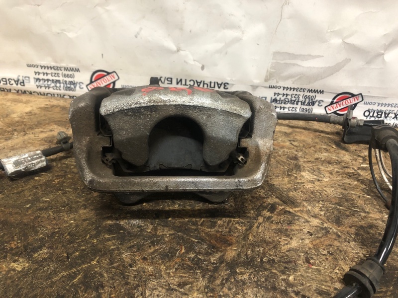 Суппорт тормозной задний левый TLX 14-17 2015 Седан 2.4