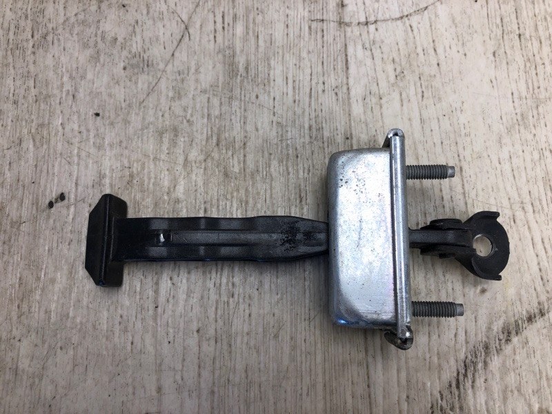 Ограничитель двери задний левый FOCUS 10-18 2015 CB8 2.0 XQDA