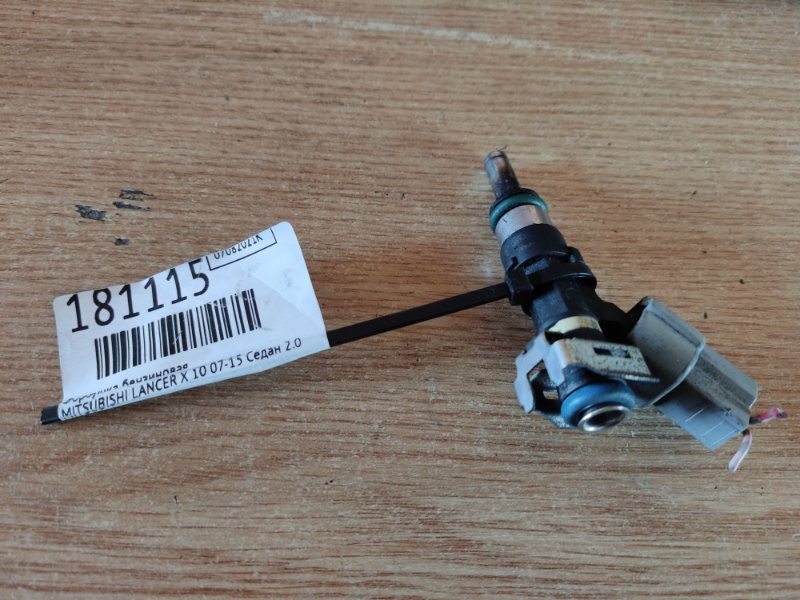 Запчасть форсунка топливная MITSUBISHI LANCER X 10 07-15 2010 Седан 2.0 4B11 1465A029 Б/У Форсунка топливная MITSUBISHI LANCER X 10 07-15 2010 Седан 2.0 4B11 1465A029 Б/У