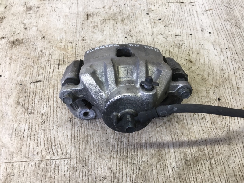 Суппорт тормозной передний левый HYUNDAI ELANTRA HD 06-11 HD