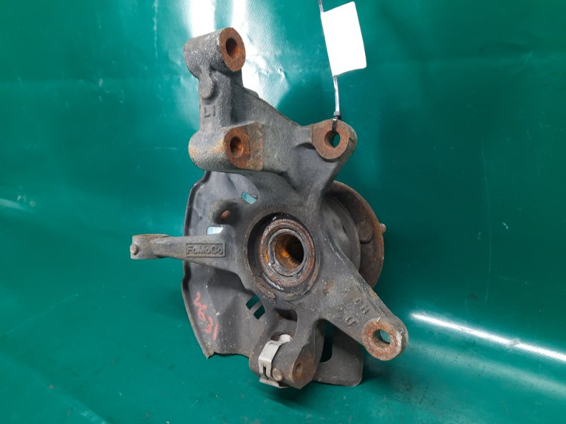 Кулак поворотный передний левый MAZDA CX-7 06-12 Внедорожник 2.3