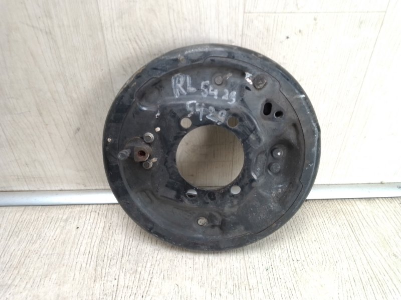 Тормозной механизм задний левый NV200 USA 13- 2015 M20XUS 2.0 MR20DE