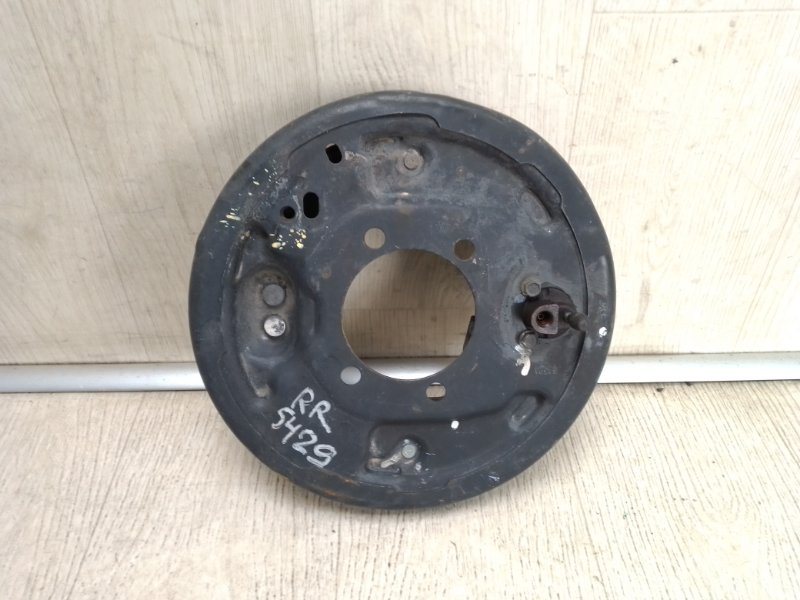 Тормозной механизм задний правый NV200 USA 13- 2015 M20XUS 2.0 MR20DE