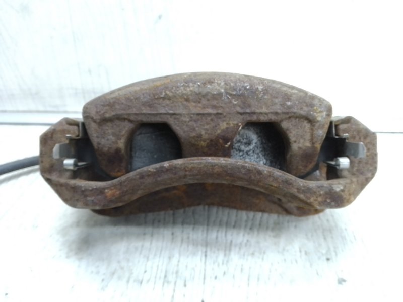 Суппорт тормозной NV200 USA 13- 2015 M20XUS 2.0 MR20DE