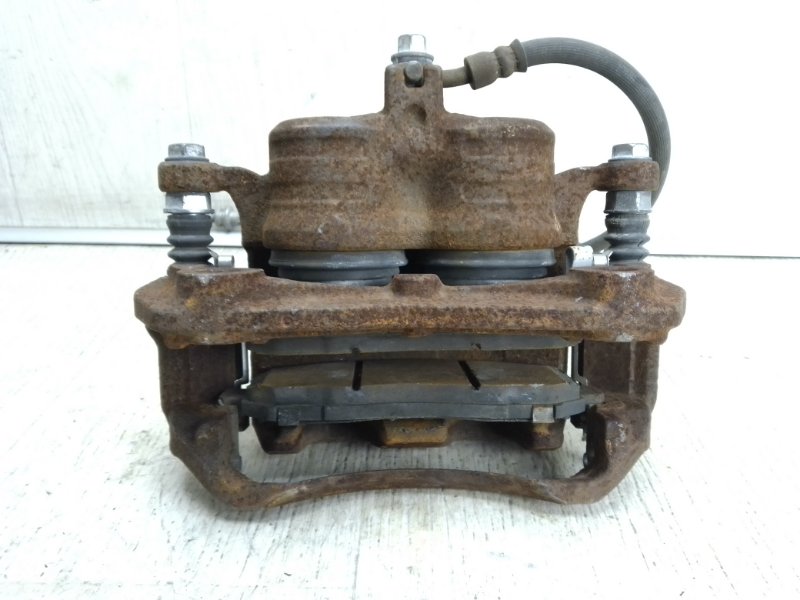 Суппорт тормозной NISSAN NV200 USA 13- M20XUS 2.0 MR20DE