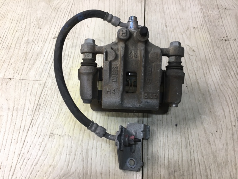 Суппорт тормозной задний правый KIA OPTIMA JF 15-20 2016 JF 2.4 G4KJ 58230-D4500 Б/У