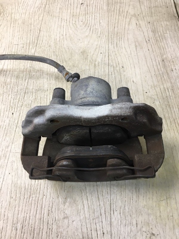 Суппорт тормозной передний левый FOCUS 10-18 2015 CB8 2.0 XQDA