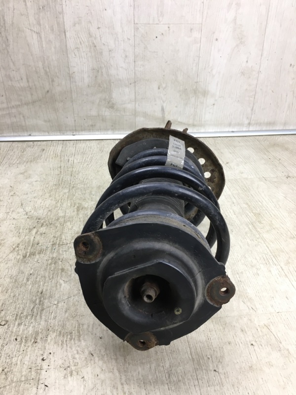 Амортизатор передний правый NV200 USA 13- 2020 M20XUS 2.0 MR20DE