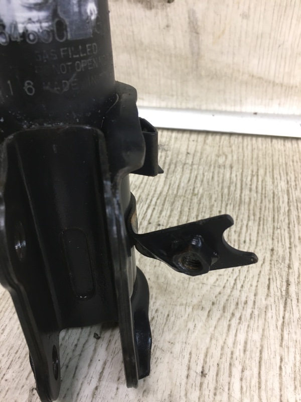 Амортизатор передний левый RIO JB 2005-2011