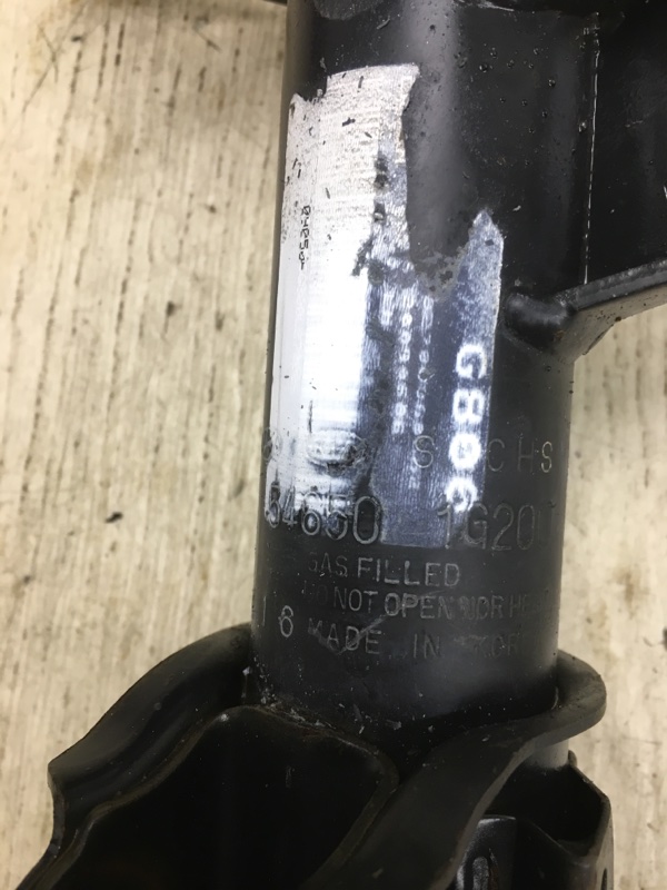 Амортизатор передний левый RIO JB 2005-2011