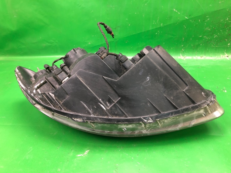 Фара левая SANTA FE (CM) 05-12 CM