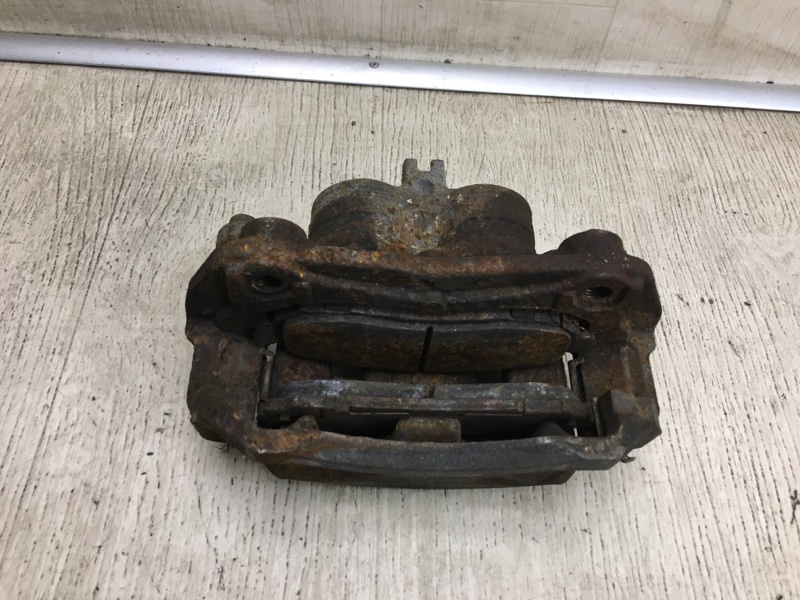 Суппорт тормозной передний правый NV200 USA 13- 2020 M20XUS 2.0 MR20DE