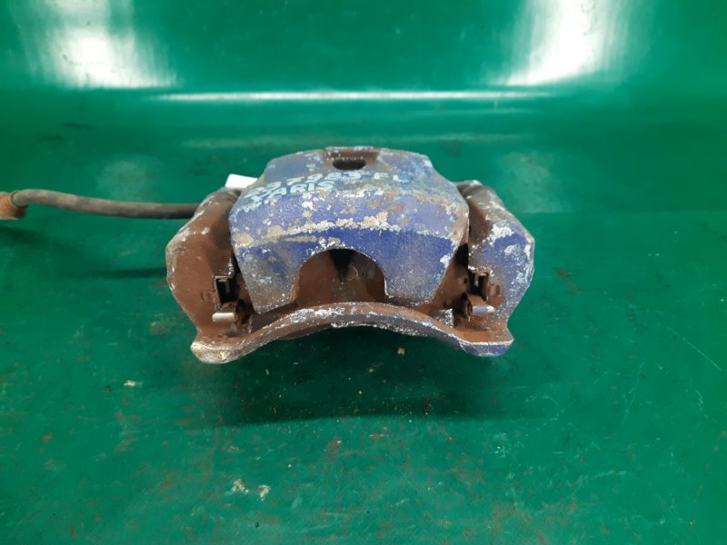 Суппорт тормозной передний левый YARIS 05–11 2008 Хэтчбек 1.5 1NZ-FE