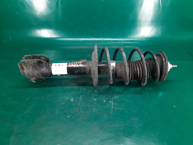 Амортизатор передний левый TOYOTA YARIS 05–11 Хэтчбек 1.5 1NZ-FE