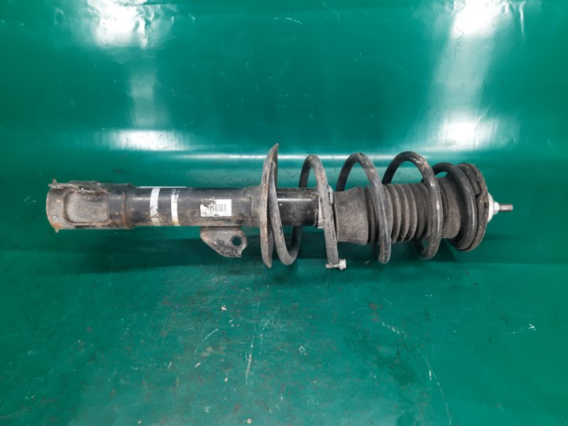 Амортизатор передний левый YARIS 05–11 2008 Хэтчбек 1.5 1NZ-FE