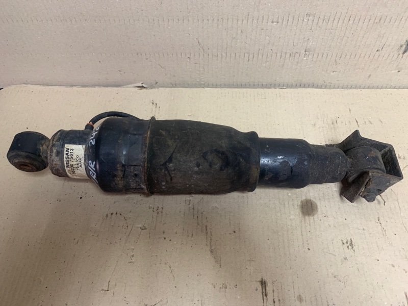 Амортизатор задний INFINITI QX56 / TITAN / ARMADA 04-16 2005 Внедорожник VK56DE 56200-7S613 Б/У