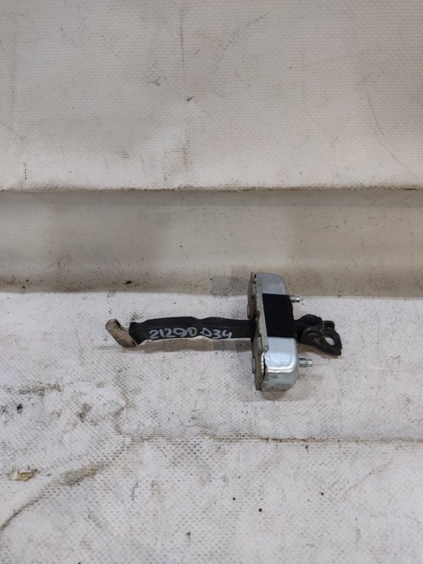 Ограничитель двери задний левый TOYOTA AURIS 06-12 Б/У