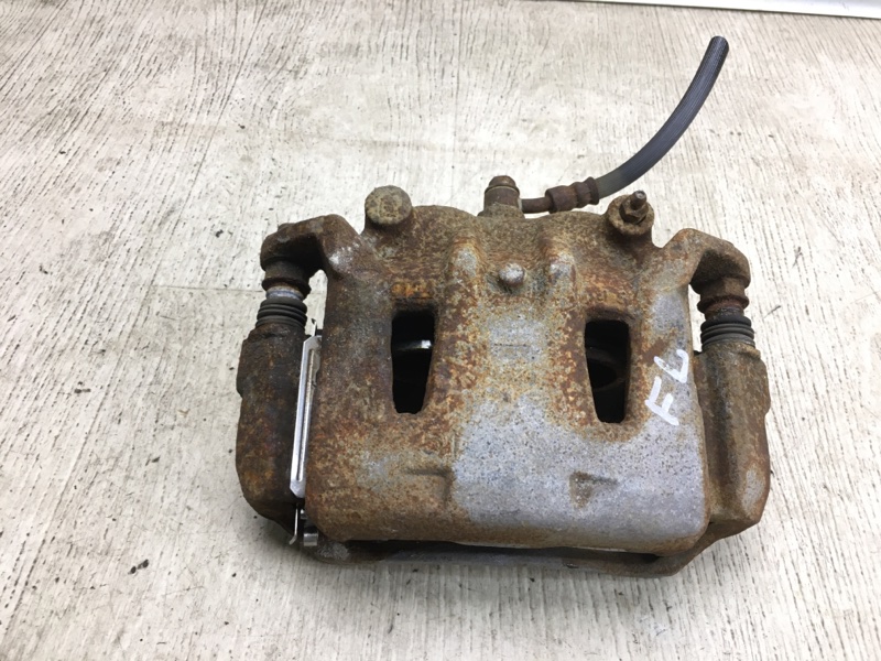 Суппорт тормозной передний левый NISSAN NV200 USA 13- 2020 M20XUS 2.0 MR20DE 41011-3LM1A Б/У