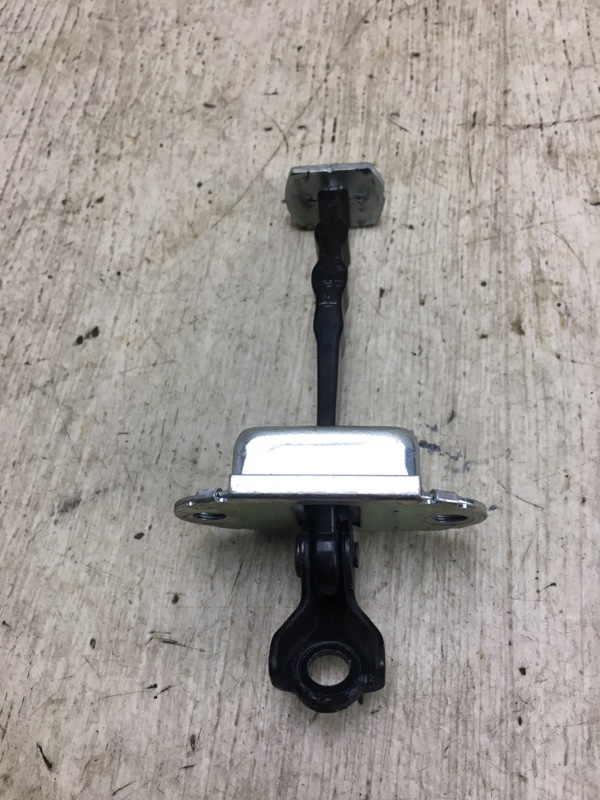 Ограничитель двери передний правый NISSAN NV200 USA 13- M20XUS 2.0 MR20DE