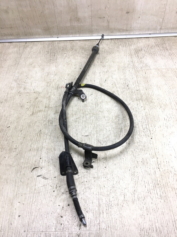 Трос стояночного тормоза задний левый KIA SORENTO UM 14- UM