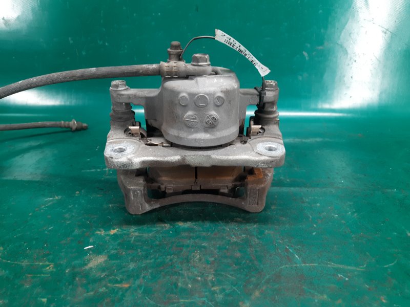 Суппорт тормозной передний левый PRIUS 16- 2016 Хэтчбек 1.8 2ZRFXE