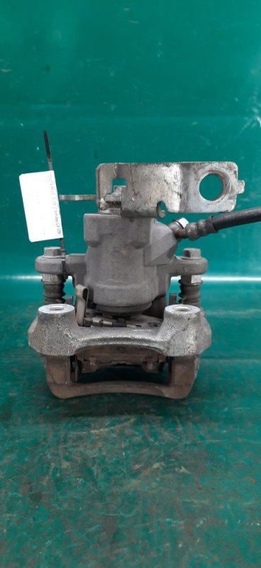 Суппорт тормозной задний левый PRIUS 16- 2016 Хэтчбек 1.8 2ZRFXE