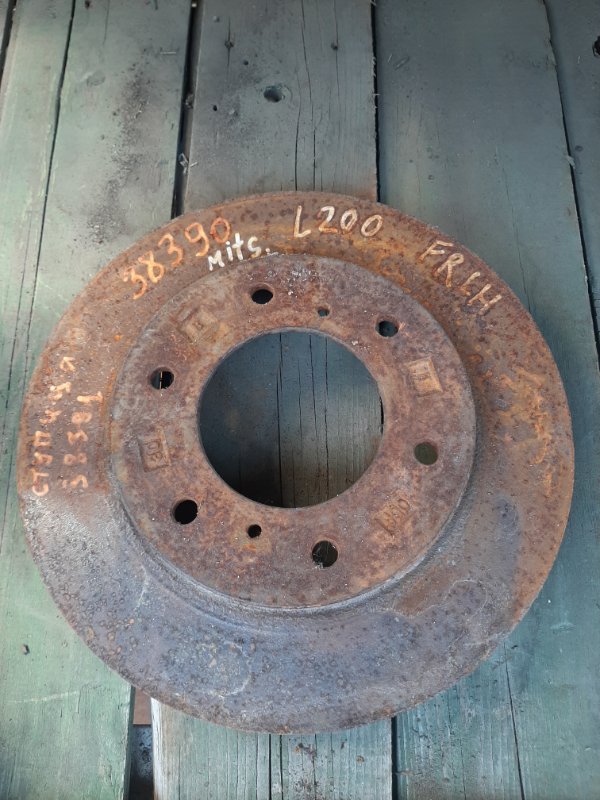 Тормозной диск передний L200 06-14