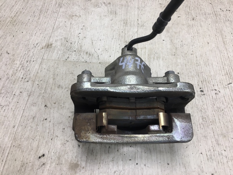 Суппорт тормозной задний левый KIA FORTE/CERATO TD 08-13 TD 2.0 G4KD