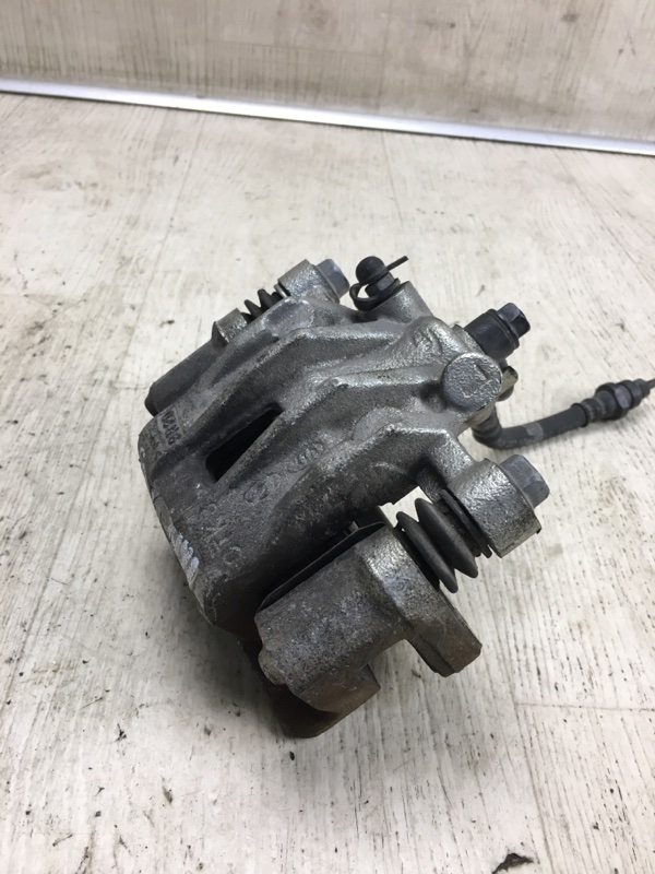 Суппорт тормозной задний левый FORTE/CERATO TD 08-13 2009 TD 2.0 G4KD