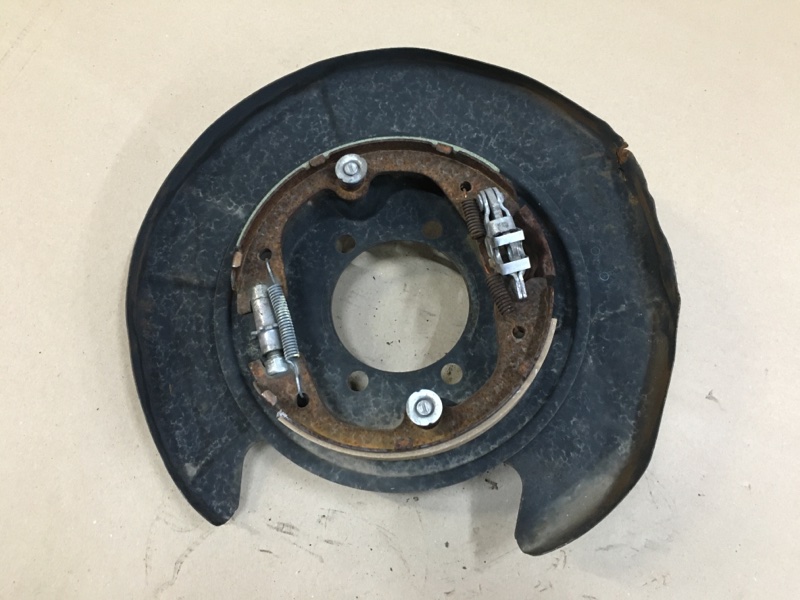 Тормозной механизм левый NISSAN PATHFINDER R52 12-21 2014 R52 3.5 VQ35DE 44010-3JA0C Б/У