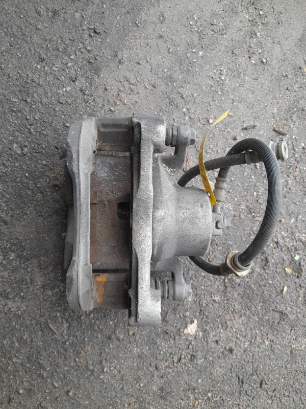 Суппорт тормозной передний левый ALTIMA L32 07-12