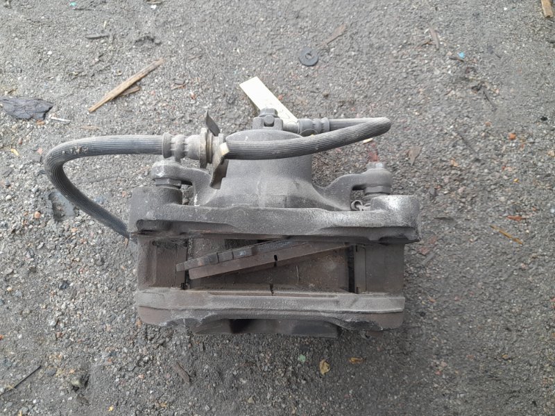 Суппорт тормозной передний правый ALTIMA L32 07-12