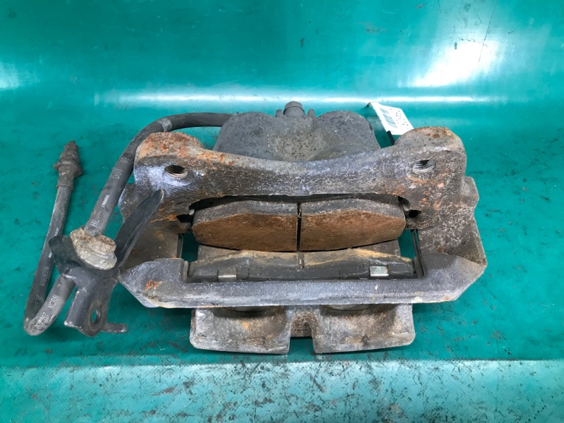 Суппорт тормозной передний левый TLX 14-17 2016 Седан 3.5