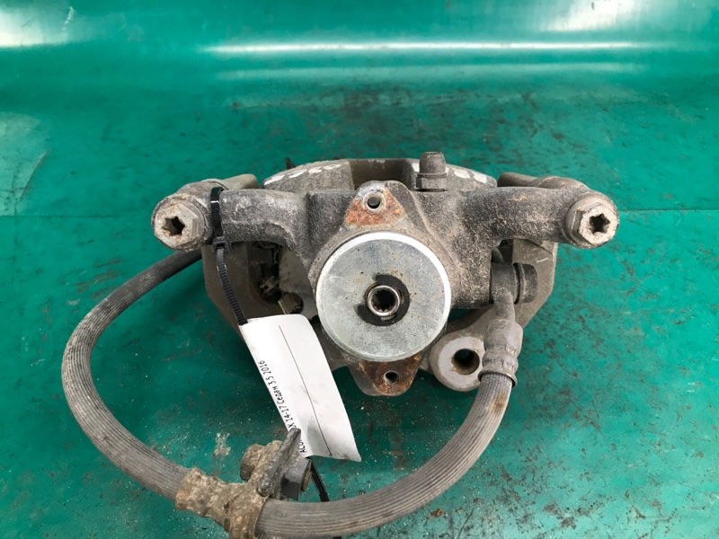 Суппорт тормозной задний левый TLX 14-17 2016 Седан 3.5