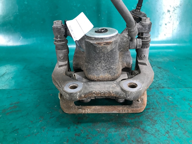 Суппорт тормозной задний левый TLX 14-17 2016 Седан 3.5