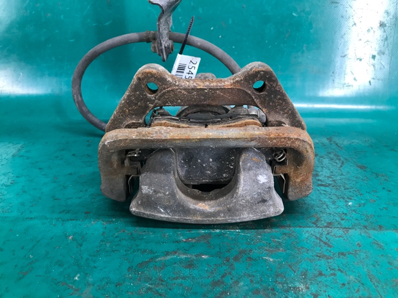 Суппорт тормозной задний левый TLX 14-17 2016 Седан 3.5