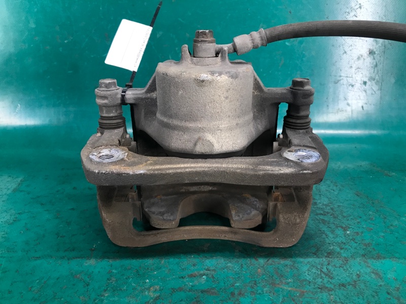 Суппорт тормозной передний левый SORENTO XM 09-14 2010 Внедорожник 2.4 G4KE