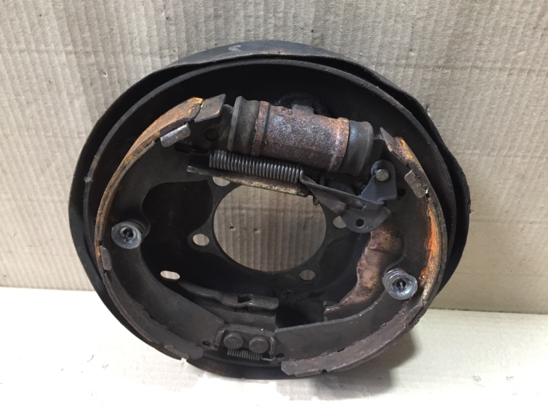 Тормозной механизм задний левый NV200 USA 13- 2017 M20X 2.0 MR20DE