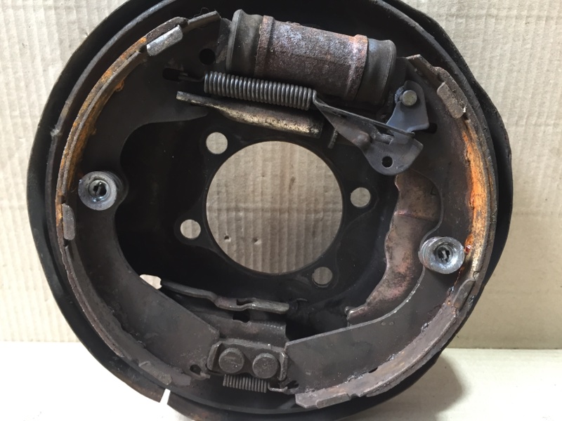 Тормозной механизм задний левый NISSAN NV200 USA 13- M20X 2.0 MR20DE