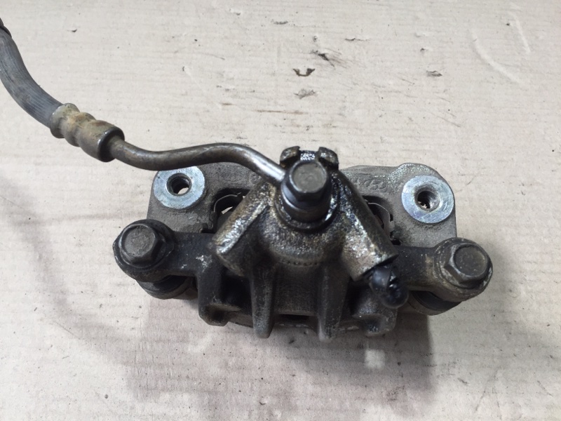 Суппорт тормозной задний правый KIA FORTE/CERATO TD 08-13 Седан G4KD 2.0L