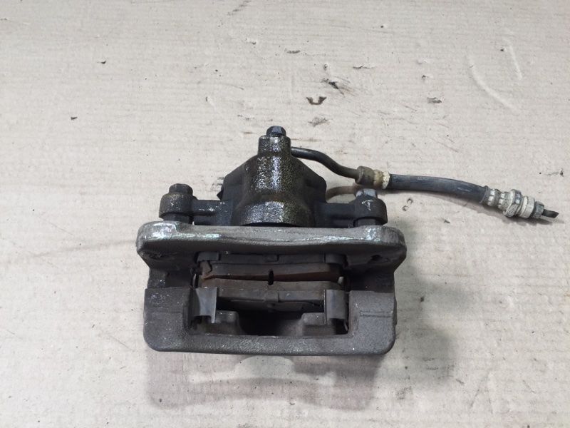 Суппорт тормозной задний правый FORTE/CERATO TD 08-13 2012 Седан G4KD 2.0L