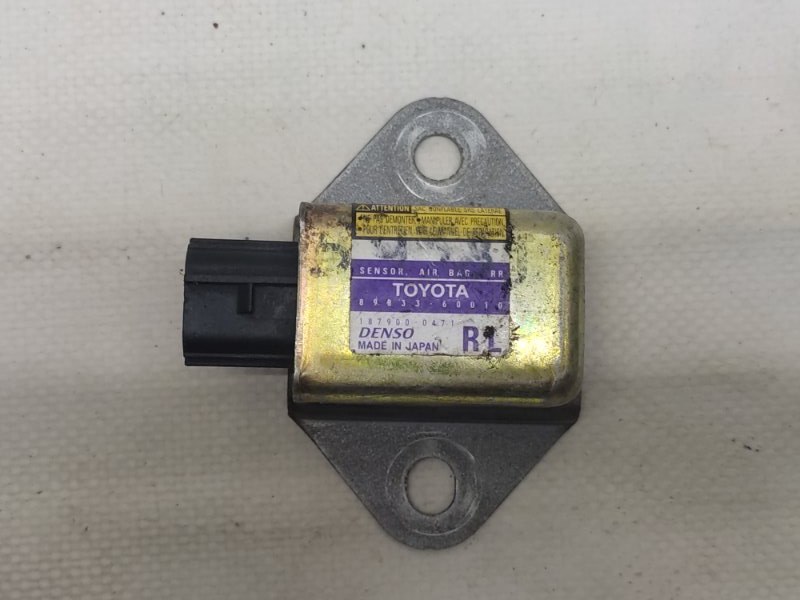 Датчик удара задний левый TOYOTA LAND CRUISER PRADO 120 02-09 89833-60010 Б/У