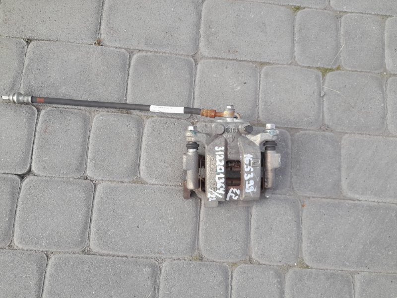 Суппорт тормозной задний левый INFINITI Q50 15-20 44011-1AA0A Б/У